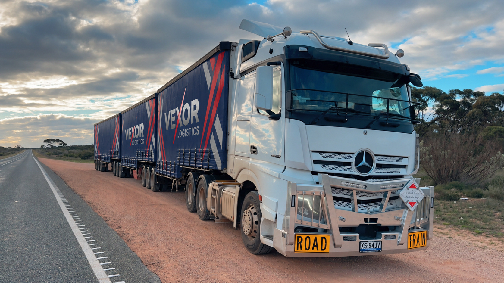 A Vexor Logistics road train on the long East-West interstate route across Australia